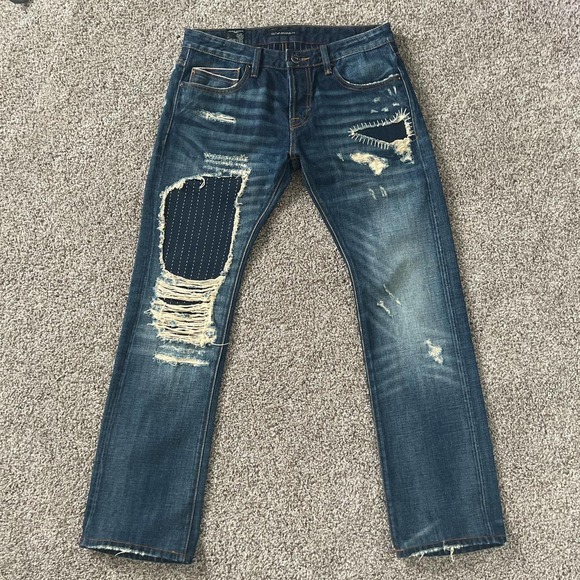 CULT OF INDIVIDUALITY VINTAGE STONE WASHED RIPPED & DISTRESSED JEANS